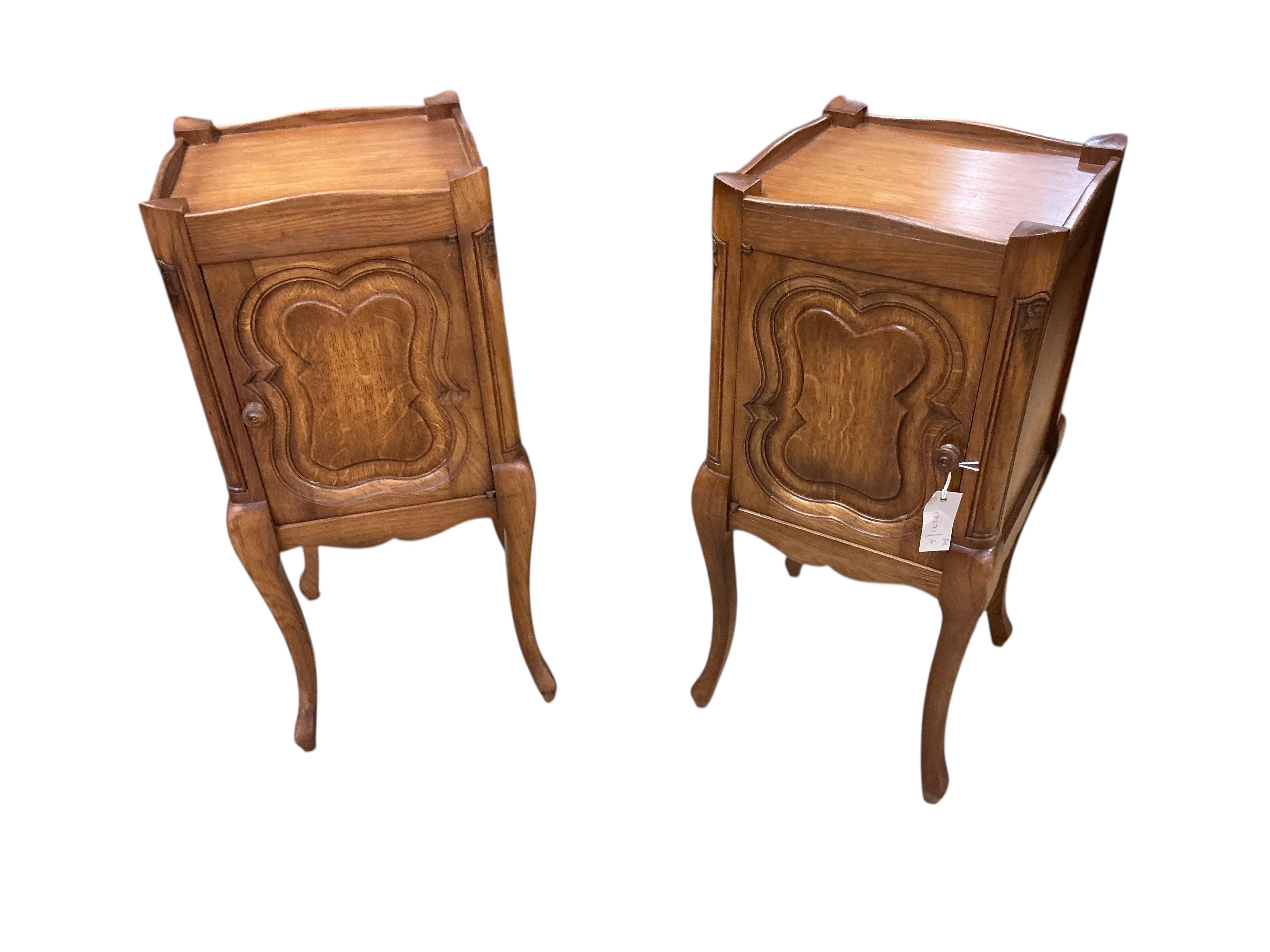 A pair of French oak bedside cabinets, width 34cm, depth 34cm, height 75cm